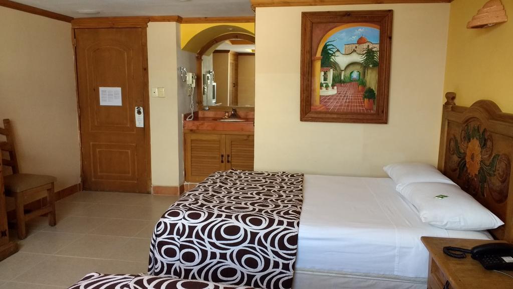 Suites Flamboyanes ميريدا المظهر الخارجي الصورة